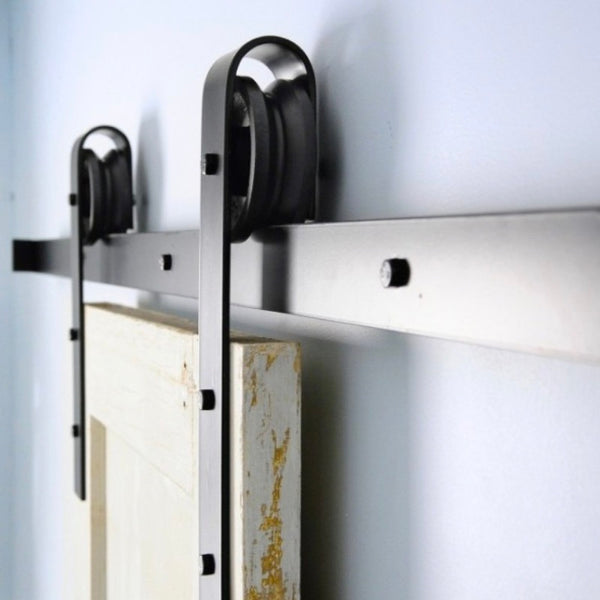 Sliding door tracks and kits