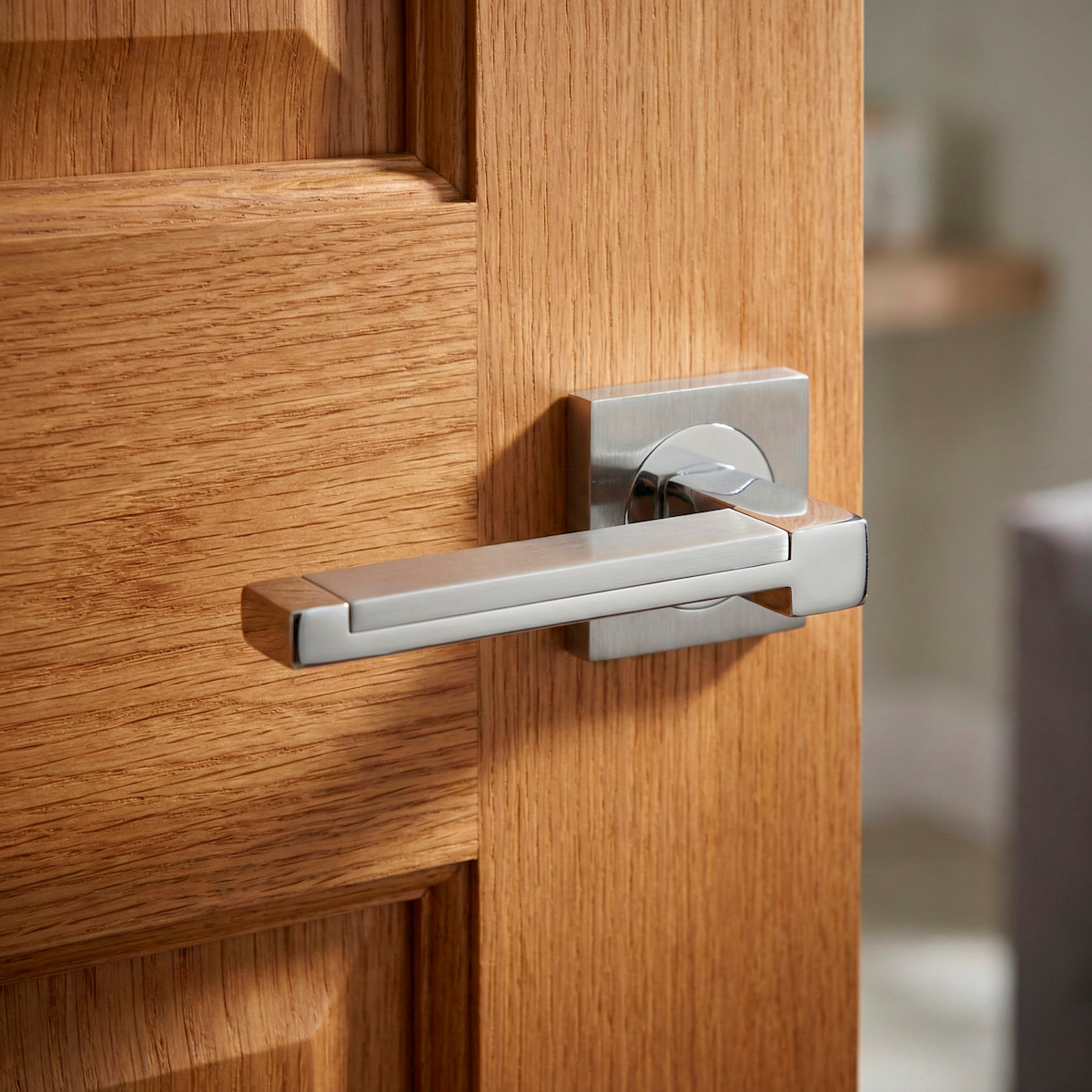 Zamak handle model 610 with square rosette in a combined nickel finish for doors