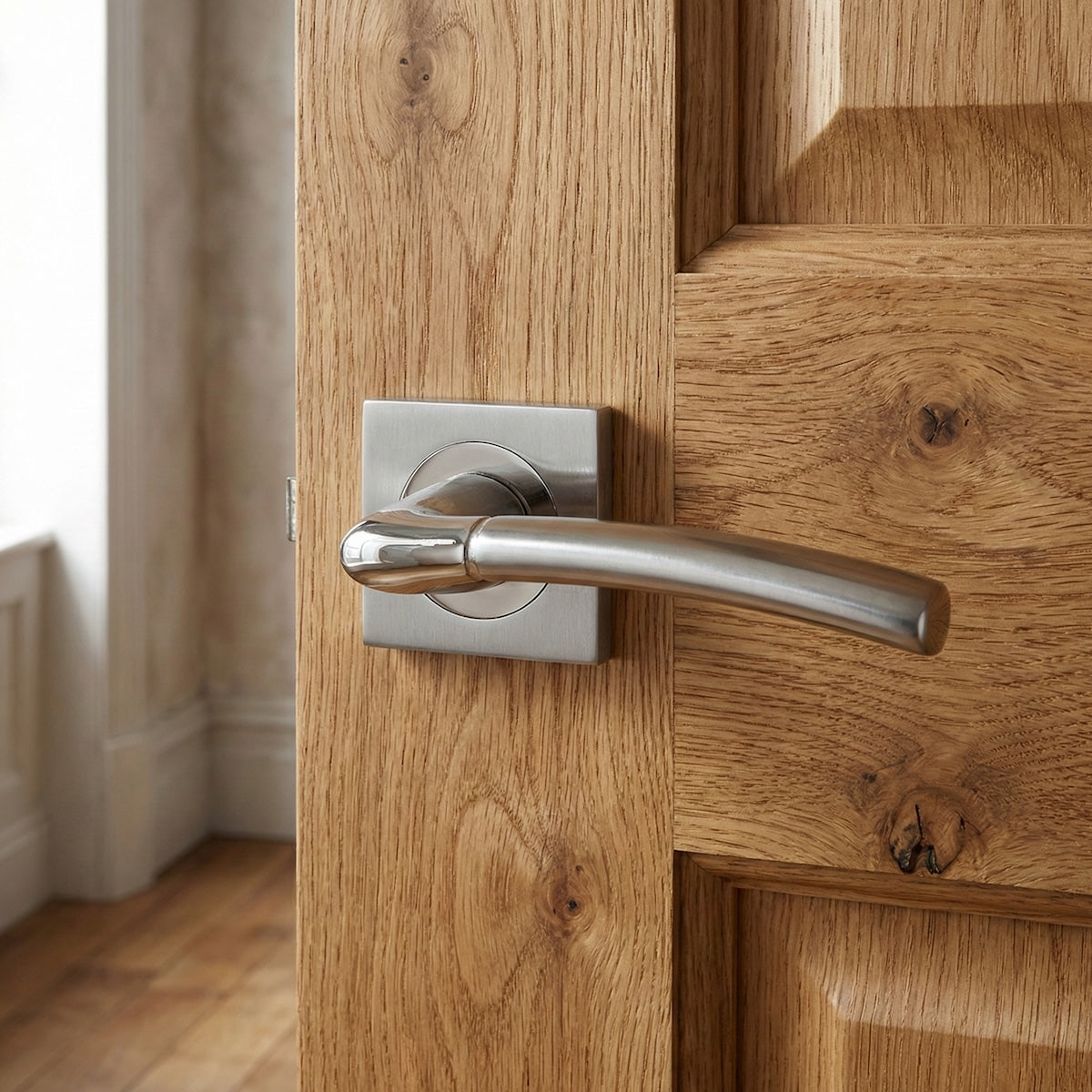 Belenus '430' ZAMAK door handle with Square Rose in two-tone finish